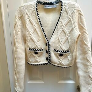 Self Portrait Ivory cable cropped cardigan , medium with black piping.